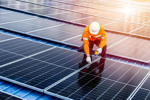 Our team installing solar panels